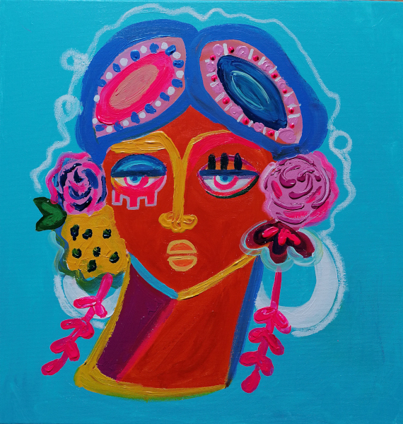 imagen de un cuadro de fondo azul y pintado el rostro de una mujer muy colorido 