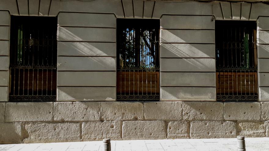 Facade with impacts in the Plaza de Oriente in Madrid