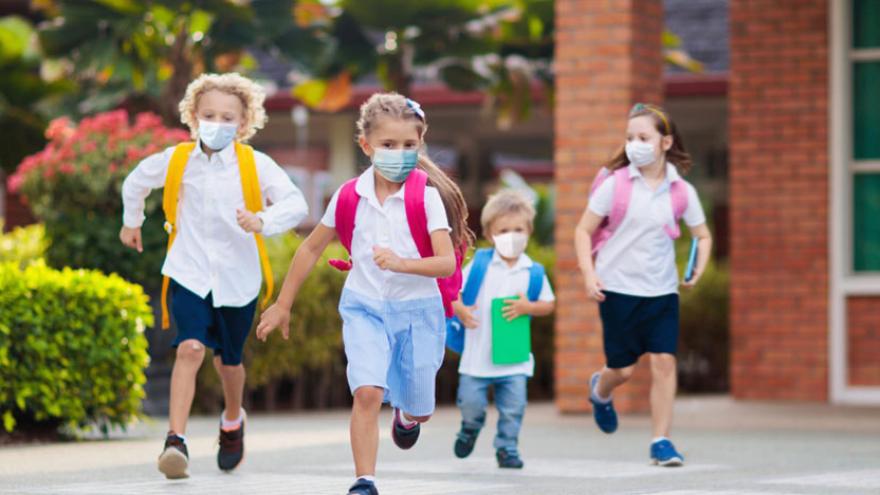 Children running on the way to school