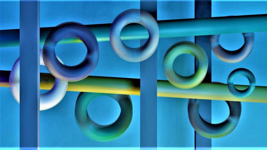 circulos y tubos verdes y azules sobre fondo azul