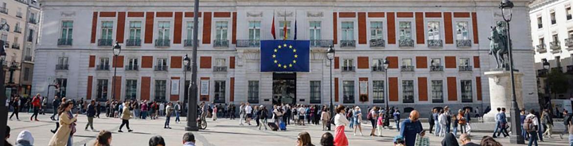 Puerta del Sol with the Royal Post Office in the background with the EU flag
