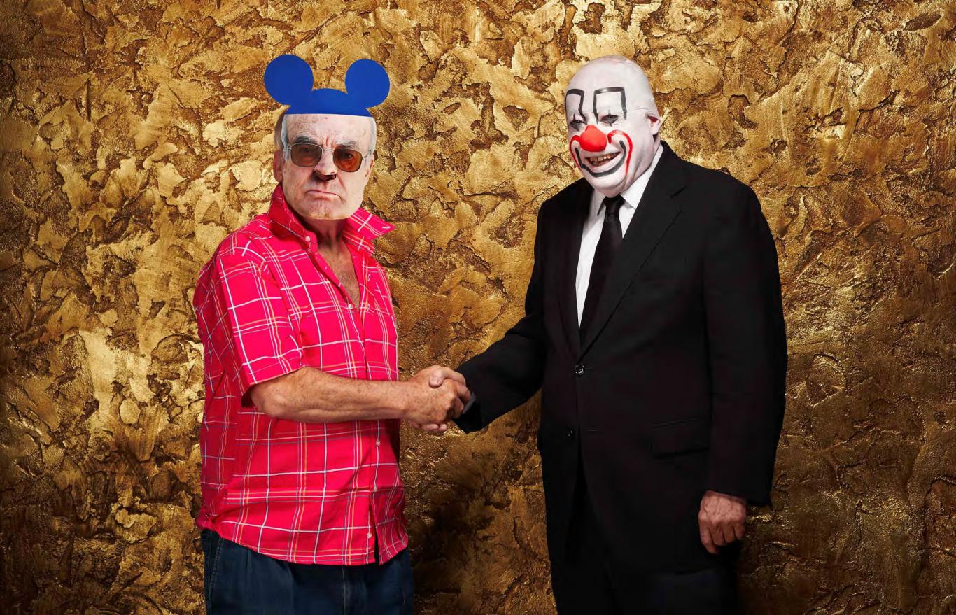 Portrait of two well-known artists, One with a mask of his own face and Mickey Mouse ears and the other with the face of a clown